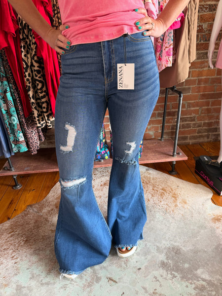Dark Denim High Rise Distressed Raw Hem Super Flares