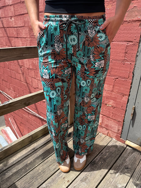 Tattoos In Turquoise Pants