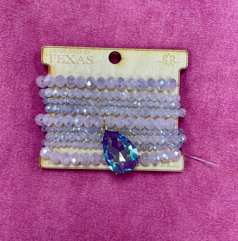 9 Strand Lilac Bead Bracelet w/ Large Purple AB Rhinestone Teardrop