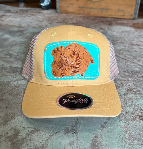 Yellow Pony Cap Floral Turquoise Background